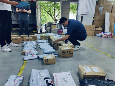 浙江省邮政管理局引领绿色物流新风尚 免胶带纸箱的推广与应用